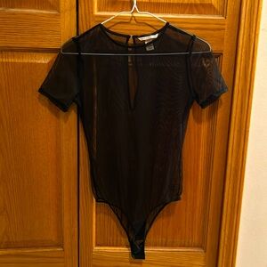 Victoria’s Secret short sleeve leotard, Hook & eye closure with gold accent. XS.